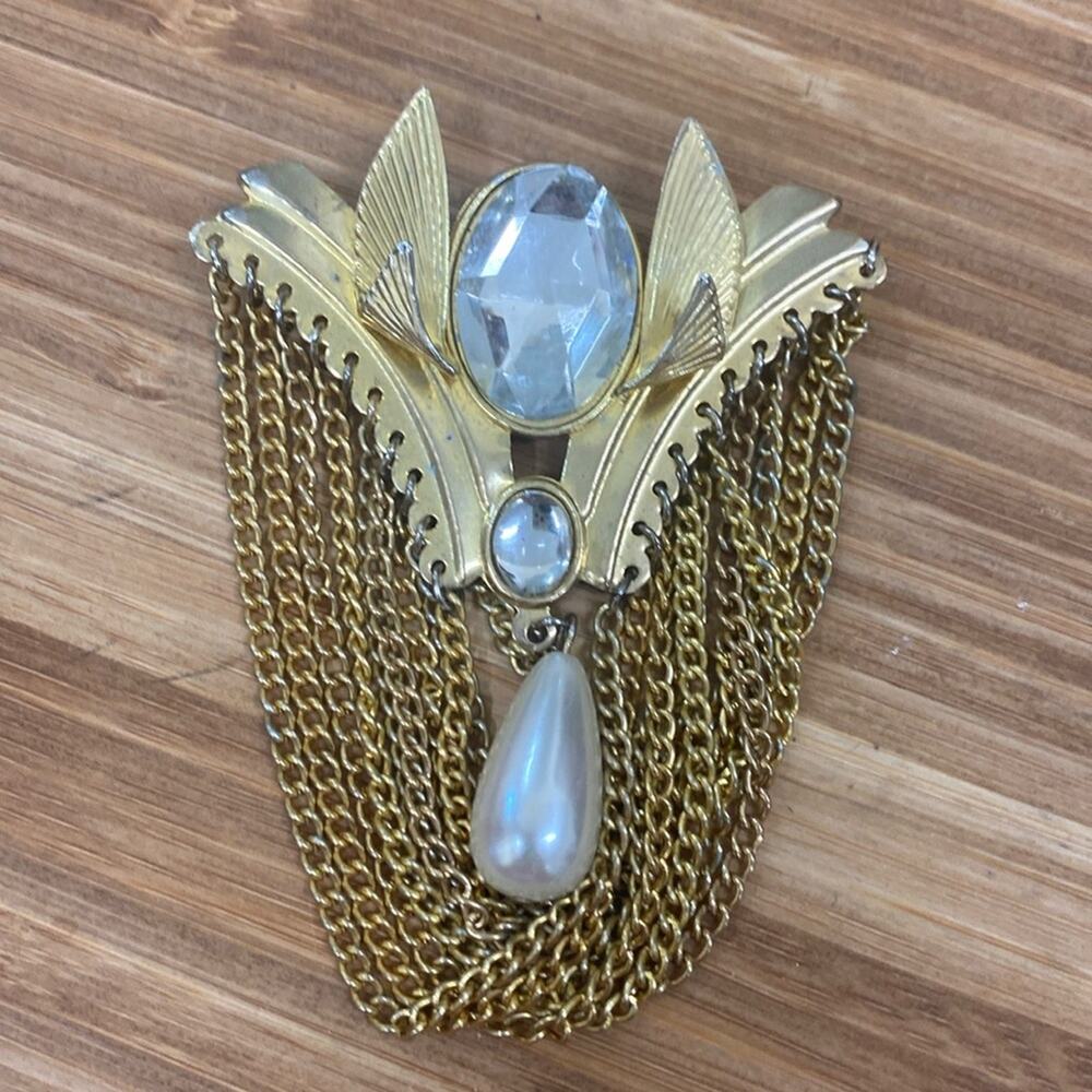 Vintage gold art deco Egyptian revival winged brooch